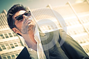 Handsome businessman with sunglasses