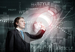 Handsome businessman using virtual interface