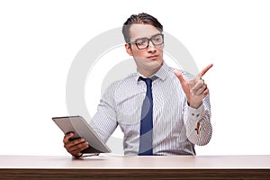 Handsome businessman working with tablet computer isolated on wh