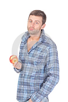 Handsome casual man eat apple