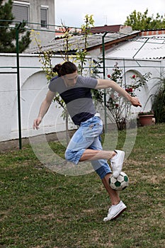 Handsome caucasian guy is working out in the nature.  Gymnastics, healthy lifestyle concept.