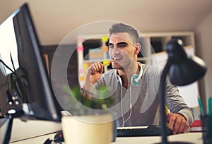 Handsome Caucasian man at work desk