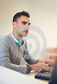 Handsome Caucasian man at work desk