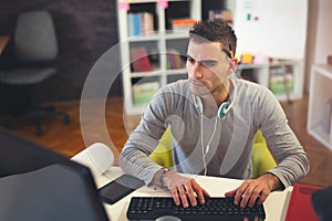 Handsome Caucasian man at work desk