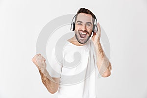 Handsome cheerful man wearing blank t-shirt