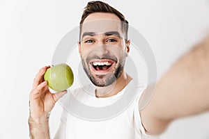 Handsome cheerful man wearing blank t-shirt