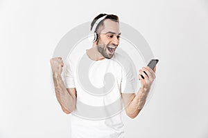 Handsome cheerful man wearing blank t-shirt