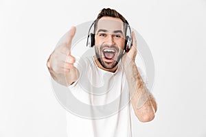 Handsome cheerful man wearing blank t-shirt