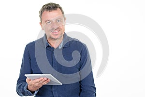 Handsome concentrated man with digital tablet computer screen