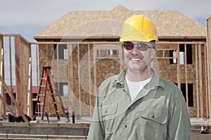 Handsome Construction Worker building a home