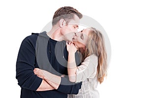 Handsome couple kissing and being happy