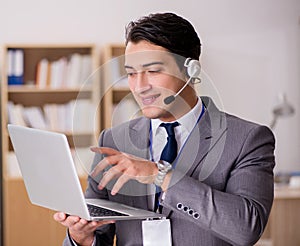 Handsome customer service clerk with headset