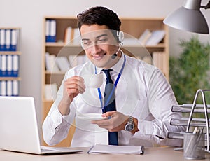 Handsome customer service clerk with headset