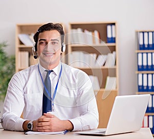 Handsome customer service clerk with headset