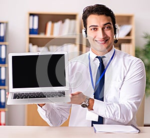 Handsome customer service clerk with headset