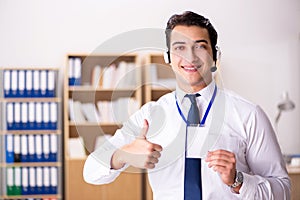 The handsome customer service clerk with headset