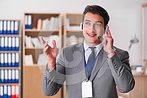 The handsome customer service clerk with headset