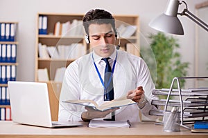 The handsome customer service clerk with headset