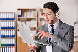 The handsome customer service clerk with headset