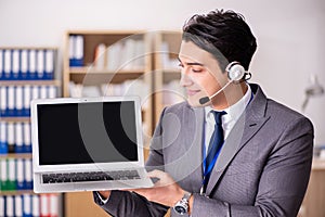 The handsome customer service clerk with headset