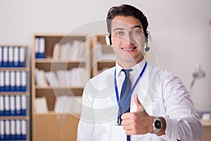 The handsome customer service clerk with headset