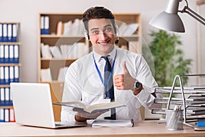 The handsome customer service clerk with headset