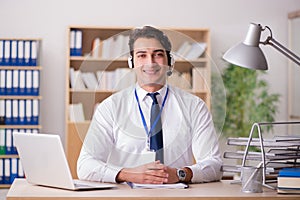 The handsome customer service clerk with headset