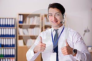 The handsome customer service clerk with headset