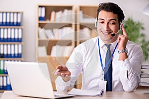 The handsome customer service clerk with headset