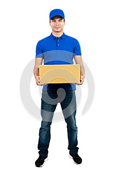 Handsome delivery man holding parcel box