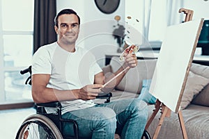 Handsome Disabled Young Man Painting Picture