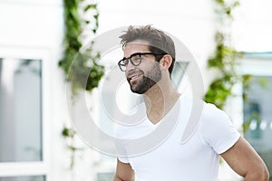 Handsome dude in white t-shirt and glasses