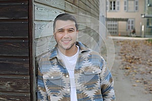 Handsome ehtnic man posing with style