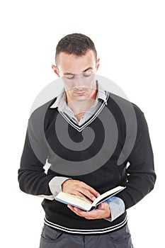 Handsome elegant young man reading book