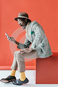 handsome excited african american man