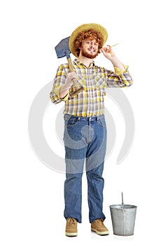 Handsome farmer, rancher isolated over white studio background