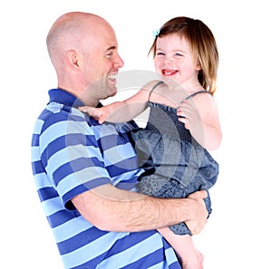 Handsome father sharing a laugh with toddler child