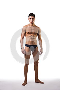 Handsome, fit young man in underwear isolated on