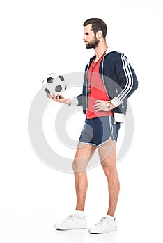 handsome football coach with ball