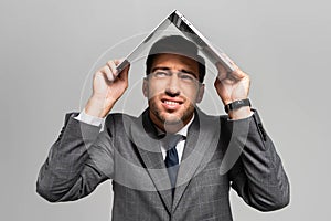 handsome and frightened businessman in suit