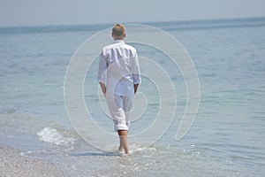 Handsome groom at wedding coat