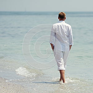 Handsome groom at wedding coat