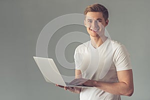 Handsome guy with gadget