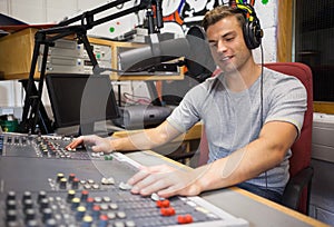 Handsome happy radio host moderating