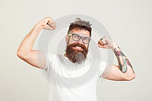 Handsome hipster guy sreaming yeah rejoicing in win. Happy winner, successful in business