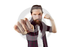 Handsome hipster punching to camera