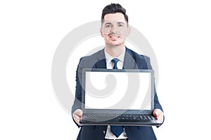 Handsome lawyer in suit holding notebook laptop in his hands