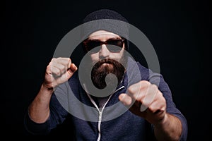 Handsome male big beard in glasses and hat