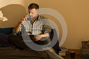 Handsome male drinking wine