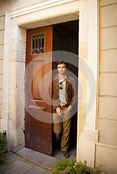 Handsome male model in a doorway